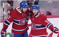  ?? PAUL CHIASSON/THE CANADIAN PRESS FILES ?? Michael Chaput, left, with Victor Mete during preseason action, has been called up to centre the Habs’ fourth line. Chaput says he was surprised to get the call, but says he’s “going to try and make the most of this one and see what happens.”