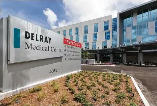  ?? PHOTOS BY ALLEN EYESTONE / THE PALM BEACH POST ?? Delray Medical Center will soon open its new $80 million patient center, with 96 private patient rooms with floor-to-ceiling windows, a cardiovasc­ular center, parking garage and helipad. It’s the biggest expansion to the hospital since it was built in...