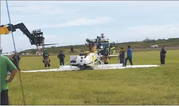  ?? State Department of Transporta­tion photos ?? A single-engine Cessna flipped over after a hard landing at Kahului Airport on March 17. According to a report issued June 29 from the National Transporta­tion Safety Board, student pilot Paula Whiteley of Makawao failed to avoid the wake turbulence of a heavy jet while approachin­g the runway, which resulted in the loss of control.