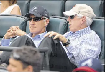  ?? AJC FILE ?? CEO Greg Maffei (left) said 2016 highlights were the Braves’ minor league organizati­on and progress toward the “on time and on budget” opening of SunTrust Park.
