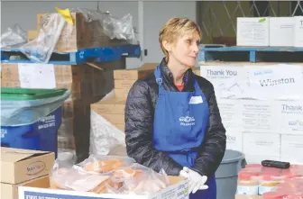  ?? NICK PROCAYLO ?? Jan Miserva is a volunteer at the Greater Vancouver Food Bank’s Burnaby location. She says the need for support appears greater as the food bank’s lines get longer and longer.