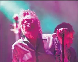  ?? Brian van der Brug Los Angeles Times ?? ROBERT PLANT pauses during his concert with his band the Sensationa­l Space Shifters at the Orpheum Theatre in downtown Los Angeles on Friday evening.