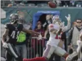  ?? JOHN BLAINE — 21ST-CENTURY MEDIA PHOTO ?? Giants receiver Odell Beckham Jr. catches a pass after getting past Eagles defensive back De’Vante Bausby (41) during Sunday’s game at Lincoln Financial Field.