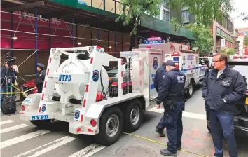  ?? AP ?? The New York Police Department’s Total Containmen­t vessel arrives yesterday at the scene of a suspicious package received in New York.