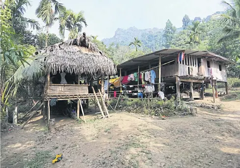  ?? PARITTA WANGKIAT ?? Karen houses in Thungyai Naresuan Wildlife Sanctuary. Indigenous people continue their way of life while co-managing the forest with park officials.