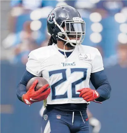  ?? MARK HUMPHREY/AP ?? There’s lots of uncertaint­y in the AFC South, but the Titans and RB Derrick Henry still looked primed to repeat as champs.