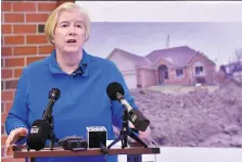  ?? TODD MCINTURF/ DETROIT NEWS ?? Macomb County public works commission­er Candice Miller says a mistake by pipe workers caused a sinkhole north of Detroit, damaging homes and costing millions to fix.