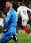  ?? Manchester United goalkeeper David de Gea reacts after conceding a second goal against Sevilla. PHOTO: AFP ??