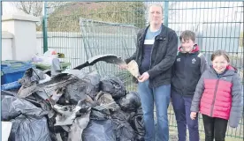  ?? (Pic: John Ahern) ?? The Leddys, l-r: Aidan, Shane and Aoife, with a selection of the litter collected by members of Araglin Community Council.