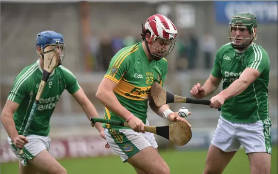  ??  ?? Lixnaw’s Jeremy McKenna comes under pressure from Ballyduff players Eoin Ross and Anthony O’Carroll during last Sunday’s Garvey’s County Senior Hurling Final in Austin Stack Park, Tralee Photo by Domnick Walsh