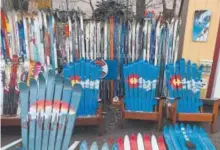  ??  ?? Colorado Ski Chairs makes Adirondack chairs and other furniture out of old skis.