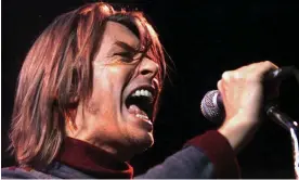  ?? ?? David Bowie performing in 1999, the year he released Hours… Photograph: Kevin Frayer/ AP