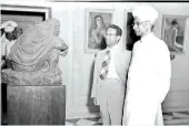  ??  ?? Union Vice-president Dr. S Radhakrish­nan, at the National Gallery of Modern Art inaugurate­d by him at Jaipur House. Beside him is Humayun Kabir.