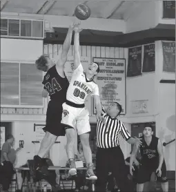  ?? Courtesy Photo ?? Spartan basketball player, David Earhart, goes up for a tip-off during a game at East Nicolaus High School. In Wednesday’s game against Hamilton, Earhart finished with 28 points.