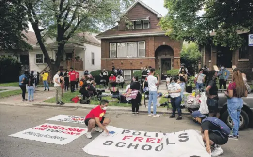  ?? PAT NABONG/SUN-TIMES ?? Youth activists staged a teach-in outside Chicago Board of Education President Miguel del Valle’s home in Belmont Cragin last week.