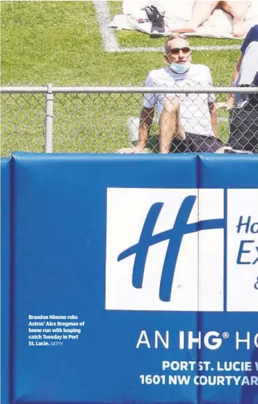  ?? GETTY ?? Brandon Nimmo robs Astros’ Alex Bregman of home run with leaping catch Tuesday in Port St. Lucie.