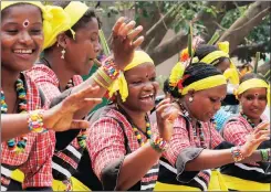  ?? Picture: EPA ?? JOYOUS: Indian folk artists dance to local tunes during a celebratio­n of Internatio­nal Women’s Day in Bangalore, India. The day’s aims are to promote women’s rights and equality.