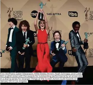  ??  ?? Finn Wolfhard, Gaten Matarazzo, Millie Bobby Brown, Noah Schnapp, and Caleb McLaughlin pose with the awards for outstandin­g performanc­e by an ensemble in a drama series for Stranger Things at the Screen Actors Guild Awards on January 29, in Los Angeles.