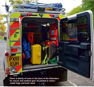  ??  ?? There is plenty of room in the back of the Defenders for rescue and medical gear all packed in colourcode­d bags and hard cases