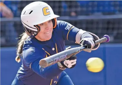  ?? STAFF FILE PHOTO BY ROBIN RUDD ?? UTC’s Katie Corum lays down a sacrifice bunt against the Austin Peay Governors in the first game at Jim Frost Stadium on Feb. 9.