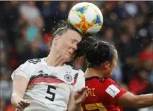  ?? The Associated Press ?? Germany’s Marina Hegering and Spain’s Nahikari Garcia compete for the ball at Stade du Hainau in Valencienn­es.