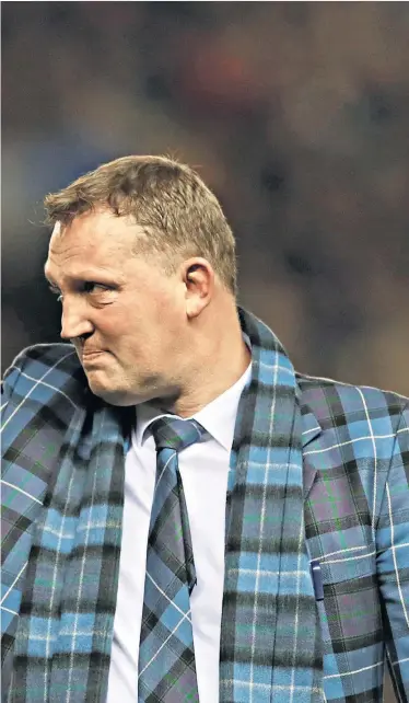  ??  ?? Murrayfiel­d memories: Doddie Weir waves to the cheering crowd and (above left) soaks in the atmosphere with sons Angus, Hamish and Ben