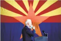  ?? BRENDAN SMIALOWSKI GETTY IMAGES ?? Democratic presidenti­al candidate Joe Biden speaks to supporters during a campaign stop in Phoenix.