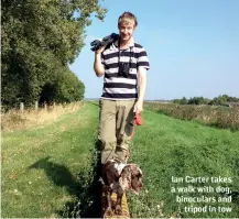  ??  ?? Ian Carter takes a walk with dog, binoculars and tripod in tow