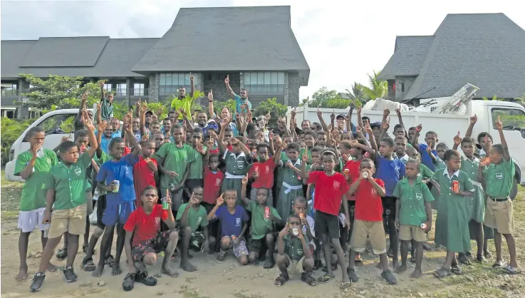  ?? Photo: InterConti­nental Fiji Golf Resort and Spa ?? Students from Malomalo Primary School and Rahmatulla­h Khan Memorial School enjoy soft drinks at the completion of the clean-up campaign at the Natadola picnic area last week.