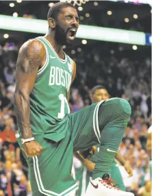  ?? Maddie Meyer / Getty Images ?? Boston guard Kyrie Irving is pumped in the fourth quarter, when he scored 11 of his 16 points in the Celtics’ victory.