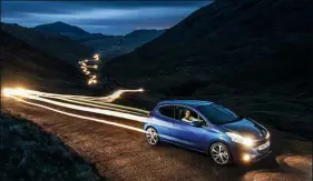  ??  ?? Peugeot 208 HD (middle)
‘We arrived late in the Lake District so I thought we’d grab a few shots before the main shoot the next day. Peugeot wanted to highlight journalist Amanda Stretton, so I lit her with flashguns after she’d driven through the valley for a 15-minute exposure for the light trails.’