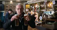  ??  ?? George Mcdonald, from Clemiston, is the first customer in months to be served at The Scotsman’s Lounge pub in Edinburgh