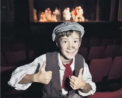  ?? PHOTO: GREGOR RICHARDSON ?? Nerves and excitement . . . Felix Kamo in costume, ready to play Gavroche on the opening night of Les Miserables at the Regent Theatre tonight.