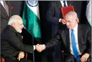  ?? REUTERS ?? Prime Minister Narendra Modi shakes hands with Israeli Prime Minister Benjamin Netanyahu as they deliver joint statements during an exchange of co-operation agreements ceremony in Jerusalem on 5 July, 2017.