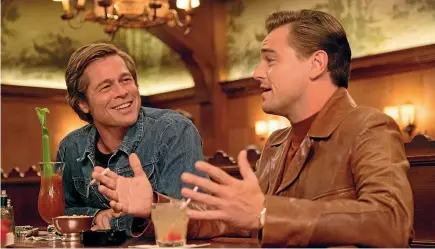  ??  ?? Brad Pitt and Leonardo DiCaprio are perfect as the ageing duo at the heart of Once Upon a Time in Hollywood.