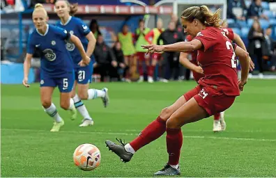  ?? GETTY IMAGES ?? Spot on: Katie Stengel fires Liverpool level before grabbing a late penalty winner