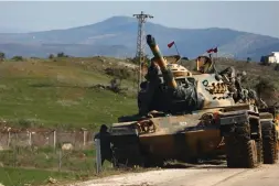  ?? (Reuters) ?? A TURKISH tank on the Syrian border.