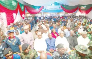  ?? ?? Security operatives and locals during one of the town hall meetings with the FCT Minister at Kwali recently