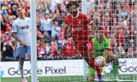  ?? Anfield. Photograph: John Powell/Liverpool FC/Getty Images ?? Mohamed Salah of Liverpool scores the third goal against Aston Villa in the 3-0 win at