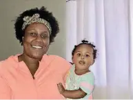  ??  ?? Rashana Avant and 1-year-old daughter, Ava, are shown in their apartment after interior decorating by nonprofit Focus on Home.