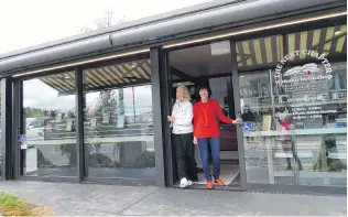  ?? KERRIE WATERWORTH ?? Reading matters . . . Managing to stand in the entrance to Wanaka’s just opened independen­t book shop ‘‘The Next Chapter’’ are coowners Jennifer Ainge and Sally Battson (right).