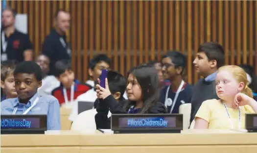  ??  ?? Some children at the UN headquarte­rs in New York during the 2017 World Children’s Day celebratio­n