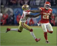  ?? MARK J. TERRILL - THE ASSOCIATED PRESS ?? Kansas City Chiefs’ Damien Williams, right, pulls away from San Francisco 49ers’ Jimmie Ward on his way to the final touchdown during the second half of the NFL Super Bowl 54football game Sunday, Feb. 2, 2020, in Miami Gardens, Fla.