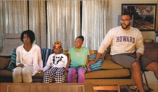  ?? Photograph­s by Claudette Barius Universal Pictures ?? THE WILSONS, played by Lupita Nyong’o, left, Evan Alex, Shahadi Wright Joseph and Winston Duke, are confronted by a few frightenin­g and oh-so-familiar faces.