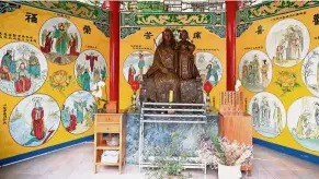  ??  ?? When cultures meld: Statues of saints are displayed in a Chinese-style pavilion in the Holy Spirit Church in Yanshui, about an hour’s drive from the southern city of Tainan. — AFP