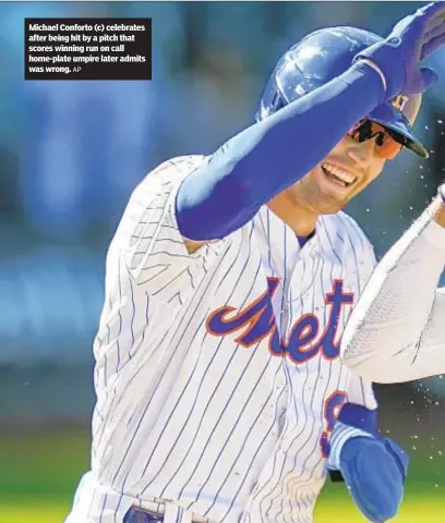  ?? AP ?? Michael Conforto (c) celebrates after being hit by a pitch that scores winning run on call home-plate umpire later admits was wrong.