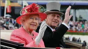  ?? (AP/Alastair Grant) ?? Queen Elizabeth II and Prince Philip are shown in June 2011 in Ascot, England. Elizabeth was known to refer to Philip as “her rock.”