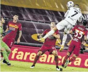  ?? (Photo: AFP) ?? Juventus’s Portuguese forward Cristiano Ronaldo (top right) heads the ball to score an equaliser past Roma’s Italian goalkeeper Antonio Mirante (left) during the Italian Serie A football match yesterday at the Olympic stadium in Rome.