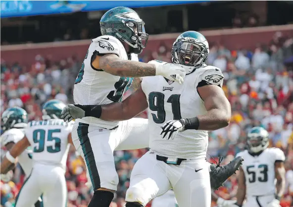  ??  ?? Pro Bowl defensive tackle Fletcher Cox, right, and the Philadelph­ia Eagles will test the Patriots in next Sunday’s Super Bowl with their deep defensive line, a crew that has even won praise from New England head coach Bill Belichick. — THE ASSOCIATED...