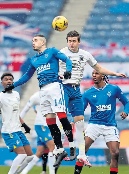  ??  ?? Rangers’ Ryan Kent, left, and Kilmarnock’s Aaron Mcgowan battle for possession at Ibrox yesterday